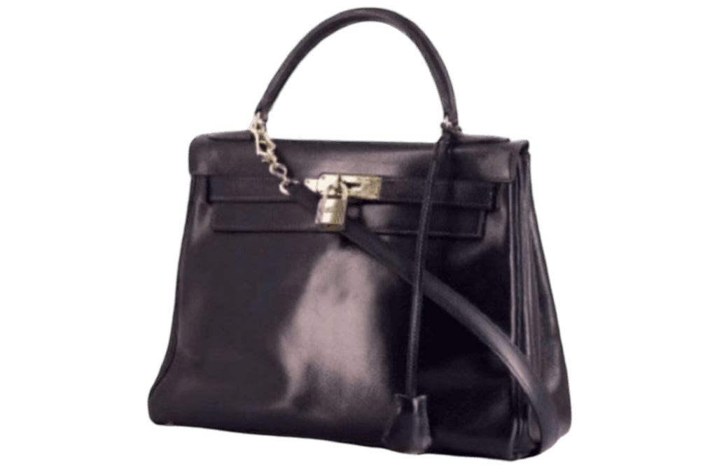Sac Hermès Kelly en cuir noir avec fermoir et cadenas dorés